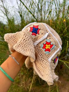 This bucket hat was handcrafted and meticulously stitched together using a healthy blend of 100% cotton yarn. Each granny square was created from scratch and then crocheted together to form the classic bucket hat design. One Size Fits Most. Yarn is Strechable. Bucket Hat Design, Hat Design, Bucket Hats, San Antonio Tx, Crochet Hat, Granny Square, Gift Registry, Cotton Yarn, Gift Baskets