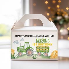 a birthday card box with a tractor on the front, and a thank you for celebrating with us