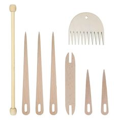 the tools needed for making wooden spoons and spatulas are laid out on a white background