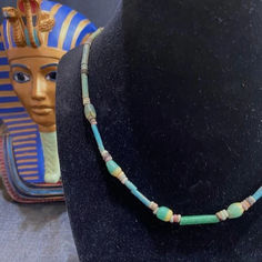 An ancient Egyptian 18 inch long necklace featuring tubular and disc shaped faience beads and green/yellow bi-color glass beads.  Circa 300 to 50 BC Green Yellow, Glass Beads, Beaded Necklace, Beads, Yellow