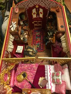 a doll house with furniture and accessories in the middle of it's floor area