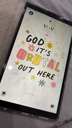 a tablet with the words god it's bruht out here