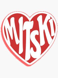 a heart shaped sticker with the word mtsk in white and red on it