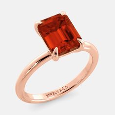 This stunning solitaire ring features a mesmerizing emerald-cut gemstone, the perfect way to celebrate a birthday or make a heartfelt statement. The elegant emerald cut, with its clean lines and elongated facets, flatters a variety of gemstones and brings out their unique brilliance.Features High-Quality Gemstones: Each ring features a genuine, ethically sourced gemstone, meticulously chosen for its color, clarity, and cut. Durable Setting: The emerald-cut gemstone is securely set in a [prong se Timeless Emerald-cut Ruby Ring, Emerald Cut Solitaire Emerald Ring For Proposal, Rose Gold Emerald Cut Gemstone Birthstone Ring, Emerald Cut Gemstone Birthstone Ring For Anniversary, Emerald Cut Ruby Ring Gift, Rose Gold Emerald Cut Birthstone Ring, Classic Emerald Cut Ruby Ring As Gift, Solitaire Emerald Cut Ring For Proposal, Classic Emerald Cut Emerald Ring In Rose Gold