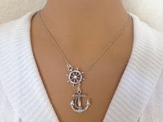 "Anchor and Wheel Lariat style silver plated Necklace with 18\" Chain with barrel clasp for closure. on Wheel its says \"LOVE\" All Navy People Really Love this Approximate Charm Size Anchor - 1 inch Wheel - 1 inch Charm Material - Plated Hand made by me" Silver Metal Lariat Necklace With Lobster Clasp, Nickel-free Metal Lariat Necklace Gift, Personalized Silver Lariat Necklace, Sterling Silver Lariat Necklace With Lobster Clasp As Gift, Silver Plated Necklace, Made By Me, Necklace Etsy, Silver Plate, 1 Inch