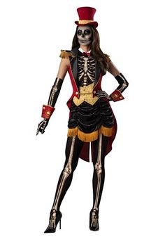 a woman in skeleton costume standing with her hands on her hips and wearing a top hat