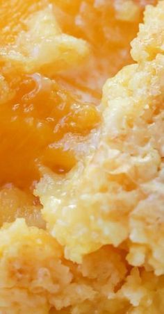 close up view of the inside of an orange pie with crumbs on it