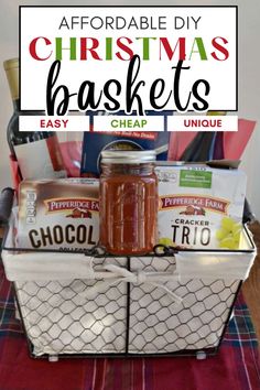 a christmas basket filled with food and condiments on top of a plaid table cloth