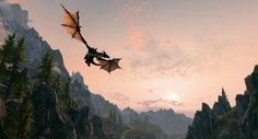 a dragon flying in the sky over some mountains