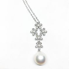 Our Unique Pendant Is Designed With White Freshwater Pearl , Cubic Zirconia And 925 Sterling Silver. You Can Wear It All Day Long. Jewelry : Pearl Pendant Pearl Type : Freshwater Pearl Pearl Grade : AAA+ Pearl Luster : High Pearl Body : Clean Pearl Shape : Round/ Drop Pearl Nacre : All (100% nacre)  Necklace Length : 18 Inches = 45.7cm  Pearl Color : *White/Pink/Gray/Black Pearl Size: Approx  7-8mm, 8-9mm, 9-10mm, *10-11mm ,11-12mm Clasp : 925 Sterling Silver Metal: Sterling silver Sterling Silver Chain: 18 inches Size Of Pendant : Approx  Length40mm x 16MM  Width *Nice Jewelry Box Wrap Thanks For Choosing Blest Jewellery :)   Blest Jewellery *Professional Jewellery Design  (since 2010)  Website: http://blestjewellery.yolasite.com online shop : www.etsy.com/shop/blestjewellery Facebook /In Jewellery Pearl, Art Jewelry Design, Jewelry Pearl, Professional Jewelry, White Freshwater Pearl, Pearl Types, Unique Pendant, Pearl Color, Pearl Size