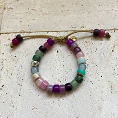 These bracelets and necklaces are a collection based around a rainbow of gemstone pony beads. Add-on stones can be purchases additionally here, please specify if you want your add on strung on your bracelet in the personalization comments. If left blank it will be sent separately: https://www.etsy.com/listing/946252171/bracelet-add-ons?ref=shop_home_active_4 All of my cords are one size fits all. Stones are subject to availability and may be substituted when necessary. Precious gems are formed in different ways and composed of different materials, meaning their appearances vary vastly. Gems may be treated to enrich color. Recommended to be stacked with many! Beaded with love ❤️. Bracelets And Necklaces, Season Of The Witch, Gemstone Beaded Bracelets, The Witch, Pony Beads, Add Ons, Precious Gems, A Rainbow, Shop Home