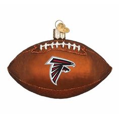 a football ornament with the atlanta falcons logo on it