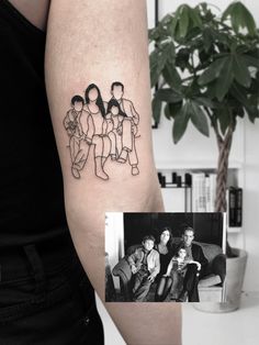 a family portrait tattoo on the left upper arm, and an image of three children