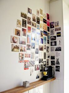 there is a wall with many pictures on it