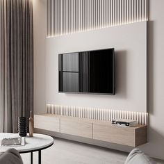 a flat screen tv mounted to the side of a wall in a modern living room