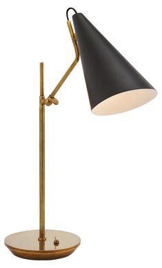 a black and gold desk lamp on a white background