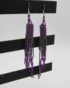 "Amazing Windsock Design Native American Style Seed Bead Earrings Ethnic Earrings BOHO Handmade Free Shipping . Stainless steel ear wires and nearly 6\" off the ear. Beautiful combination of exciting new colors for matching regalia or wearing alone. As always... Ships Free from Hawaii with Aloha!" Adjustable Large Beaded Earrings For Festival, Purple Beaded Earrings With Round Beads For Festival, Festival Purple Beaded Earrings With Round Beads, Traditional Purple Beaded Earrings, Purple Beaded Festival Earrings, Purple Beaded Dangle Earrings For Festival, Purple Beaded Earrings For Festival, Purple Colorful Beaded Earrings For Festival, Purple Dangle Beaded Earrings For Festival