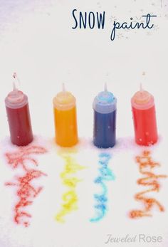 four small candles with the words snow paint written on them in different colors and shapes