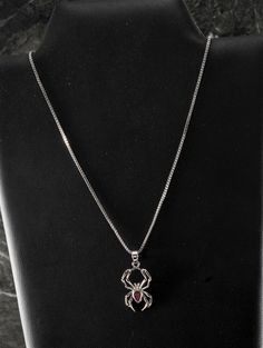 For sale is a vintage spider pendant necklace. This necklace shows a spider with a faceted red gem center on an 18" box chain. The pendant measures 3/4".  New treasures added all the time, check back often! Spider Man Necklace, Chinese Goddess, Spider Pendant, Vintage Spider, Spider Necklace, Spider Jewelry, Chain Silver, Wedding Jewellery Necklace, Grunge Aesthetic