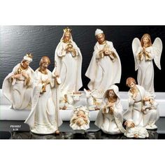 the figurines are all dressed up and ready to be put into the nativity