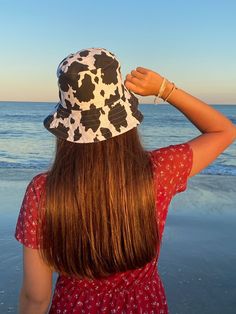 I had so much fun creating this cow print bucket hat! This hat was made using It is sized to fit a 22' inch to 24' inch head, with the brim being 3' inches. I hope you enjoy your purchase! (This product was made in a smoke-free home). Cow Bucket Hat, Cow Print Bucket Hat, Cow Print Fabric, Bucket Hats, Cow Print, Festival Captain Hat, I Hope You, Caps Hats, Bucket Hat