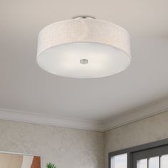 a living room scene with focus on the ceiling light