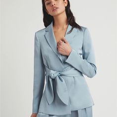 -Satin Effect Blazer With Lightly-Padded Shoulders And A Flattering Self-Tie At Waist.Lightly Padded Shoulders, Long Sleeves,Notched Lapel, Front Waist Tie. Color Light Blue, Nwt. Size 6. Notch Lapel Satin Outerwear For Fall, Fall Satin Notch Lapel Outerwear, Fall Satin Outerwear With Notch Lapel, Satin Notch Lapel Outerwear For Work, Notch Lapel Satin Outerwear For Work, Satin Long Sleeve Outerwear For Work, Chic Satin Outerwear With Notch Lapel, Fall Satin Outerwear For Office, Fall Office Satin Outerwear