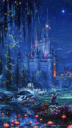 the disney castle is lit up at night with fairy lights and water lilies in front