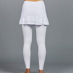 Designer Activewear.Designed and made in Miami.DESCRIPTIONUV Leggings - light solid white legging (SPF 40+ inherent in this finely knit fabric). Intended to be worn underneath any sort of choice.DETAILS & FITAthletic fit, tapered to the body.FABRIC & CARE88% Nylon / 12% SpandexSPF 40+ inherent in fabricMachine wash cold, do not bleach, tumble dry low, cool iron, do not dry clean. Ballet Leggings, Designer Activewear, Athleisure Pants, Tennis Skirts, Golf Apparel, White Leggings, Womens Tennis, Athletic Fits, White Skirts