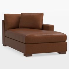 a brown leather chaise lounge chair with two pillows on the back and one arm