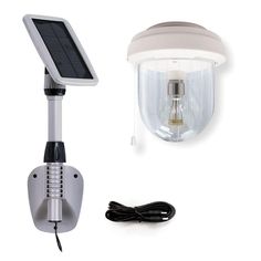 a solar powered light and lamp on a white background