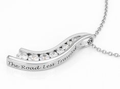 Lisa Mason for Bella Luce® white diamond simulant 1.79ctw round, platinum over sterling silver "The Road Less Traveled" pendant with chain. Pendant measures approximately 1" L x 0.25" W and has a 3mm bail. Includes a 18" L x 0.03" W cable chain that has a 2" extender and lobster claw clasp closure. The diamond equivalent weight is 1.08ctw. Anniversary Cubic Zirconia Channel Set Necklace, Channel Set Cubic Zirconia Anniversary Necklaces, Anniversary Jewelry With Diamond Accents In Stainless Steel, Diamond White Channel Set Necklace For Anniversary, Diamond White Channel Set Necklaces For Anniversary, Diamond White Necklaces With Channel Set For Anniversary, Anniversary Channel Set Cubic Zirconia Necklace, Channel Set Cubic Zirconia Necklace Gift, Anniversary Diamond White Channel Set Necklaces