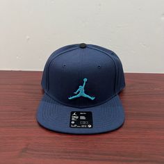 Brand - Jordan Hat Model - Nike Pro Color - Blue Style Code - Ar2118-410 Condition- Brand New Age - Adult Gender - Unisex Navy Flat Brim Hat For Sports Events, Blue Sporty Baseball Cap, One Size Fits Most, Sporty Blue Baseball Cap, One Size Fits Most, Sporty Blue Baseball Cap One Size, Sporty Blue Baseball Cap One Size Fits Most, Blue Flat Bill Hat For Streetwear, Blue Casual Sports Hat, Blue Streetwear Hat With Curved Brim, Blue Fitted Cap For Streetwear