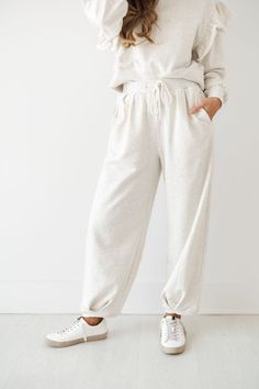 Introducing the "Gwen Sweatpants!" These heather grey sweatpants are such a cozy and elevated staple to get ready for the fall! They have a relaxed and comfortable fit that is perfect for lounging at home or for travel days. The elastic waistband with drawstring offers an adjustable fit while the loose fitting legs offer comfort! Wear as a matching set with the "Gwen Sweatshirt!" Detailed Fit: Lightweight Sweatpants Drawstring at the waist High waist fit Cinching at the ankle Pockets Overall Fit Grey Sweatpants, Comfort Wear, Cool Tones, Winter 2024, Small Waist, Style Ideas, Matching Sets, The Fall, Heather Grey