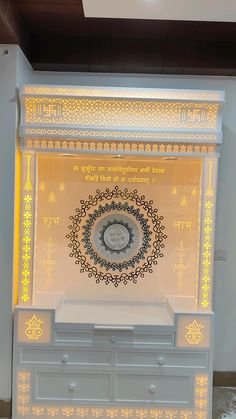 a white dresser with a clock on it in front of a yellow wall and ceiling