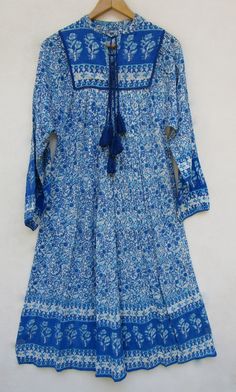 "ITEM DESCRIPTION royal blue floral printed rayon long summer maxi dress | collared neckline with tassel maxi dress | long sleeve bohemian long maxi dress Features : Long sleeve, Collared neck, Long dress Material : Soft rayon crepe fabric sleeve length- 22 inch For more sizes & their measurement, please refer our below chart to understand the sizes variations available with us For your size requirement, please mention your size in seller note at the time of buying. SIZE MEASUREMENT BUSTLENG Long Blue Floral Print Boho Dress, Blue Long Boho Print Dress, Blue Long Boho Dress With Floral Print, Long Blue Boho Print Dress, Long Blue Boho Dress With Floral Print, Blue Flowy Long Boho Dress, Blue Long Dress With Boho Print, Long Blue Boho Dress For Spring, Long Blue Dress With Boho Print