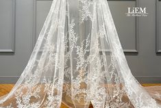 "High quality embroidery lace This fabric is perfect for Wedding Bridal Dress,Evening gown,Cocktail dress and some others. It is very gorgeous high quality fabric. ★Materials * High quality Bridal Embroidery lace * Primary fabric: Tulle * Secondary fabric: Embroidery lace * Color: Off White ★MEASUREMENTS * Price is set for 1 yard(=91.44cm). You will receive the fabric in one continuous piece if you purchase more than 1 yard. * Width : Mesh : 60~61 inch (152~154cm) Embroidered part : 55.5 inch (1 Elegant Embroidered Lace Tulle Fabric, Elegant Lace Embroidered Gown, Delicate Lace Gown, Lace Gown With Floral Embroidery For Ceremony, Bridal Embroidery, Gown Cocktail, Wedding Bridal Dress, Wedding Embroidery, Fabric Embroidery