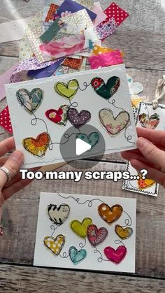 someone is holding up some heart shaped scraps to show off their crafting skills