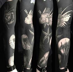 several different tattoos on both arms and legs, one is black and white the other is grey