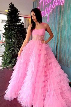 Strapless Pink Sequin Layered Formal Dress Strapless Sequin Ball Gown For Prom, Strapless Sequin Ball Gown For Prom Season, Glamorous Strapless Prom Ball Gown, Glamorous Strapless Sequin Ball Gown, Glamorous Strapless Tulle Ball Gown, Glamorous Strapless Ball Gown For Prom, Party Gown With Sweetheart Neckline And Ruffles, Glamorous Ball Gown Strapless Dress For Prom, Glamorous Tiered Evening Dress With Ruffles