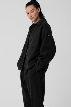 Made from a softly structured cotton blend, the One Up Jacket has a cool, utility-style look. It’s baggy and boxy in the best way (size down if you prefer a closer fit) with a point collar, matte buttons and oversized flap pockets. Balance the tomboy chic with a mini skirt, or go all in with the coordinating Road Trip Trouser. Black Cotton Utility Jacket For Everyday, Everyday Black Cotton Utility Jacket, Oversized Button-up Utility Jacket For Streetwear, Black Outerwear With Patch Pockets For Everyday, Black Cotton Relaxed Fit Shacket, Streetwear Shacket With Flap Pockets, Solid Cotton Utility Jacket For Streetwear, Oversized Cotton Techwear Outerwear, Everyday Black Utility Jacket With Pockets