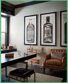 a living room filled with furniture and pictures on the wall above it's coffee table