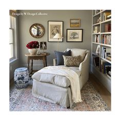 a living room filled with furniture and bookshelves next to a window covered in pictures