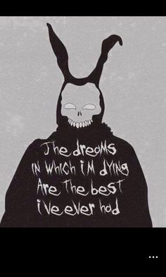 an image of a person wearing a mask with words written on the front and back