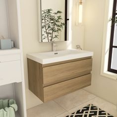 a bathroom with a sink, mirror and rug