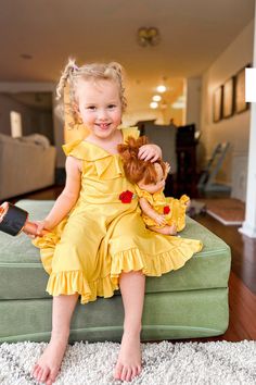 This Yellow Beauty twirl doll dress will transform your child’s doll into the Belle of the Ball. Designed to match our child dress for hours of imaginative play Made from clothing quality stretchy fabrics (machine washable!) Fastens with hook and loop closure Doll not included Made to fit 16"-20" dolls and plush animals Child Dress, Dress Yellow, Plush Animals, Imaginative Play, Hook And Loop, Yellow Dress, Doll Dress, Kids Dress, Dolls