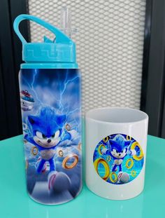 sonic the hedgehog water bottle next to a coffee mug on a blue countertop