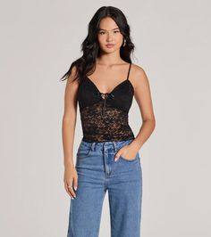 Everyone will notice how sultry you look in this lace crop top perfect for adding romance into your style! Adorned with delicate spaghetti straps, a playful V-neckline with a ribbon tie, and a sheer fitted crop hem. Complete the look in high-rise jeans for a casual date night.Fit & FeaturesSheer lace fabric, lined bustSpaghetti strapsV-neckline with ribbon tieFitted crop silhouetteRuns true to size White Holiday Dress, Homecoming Dresses Bodycon, Sequin Holiday Dress, Purple Homecoming Dress, Black Lace Crop Top, Green Homecoming Dresses, Bachelorette Dress, White Homecoming Dresses, Homecoming Outfits