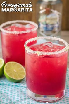 two glasses filled with watermelon margaritas on top of a table