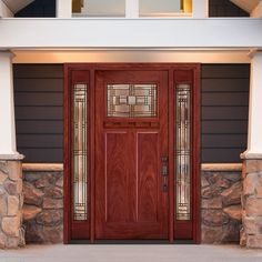 the front door is made of wood and glass